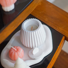 Striped pumpkin candle jar