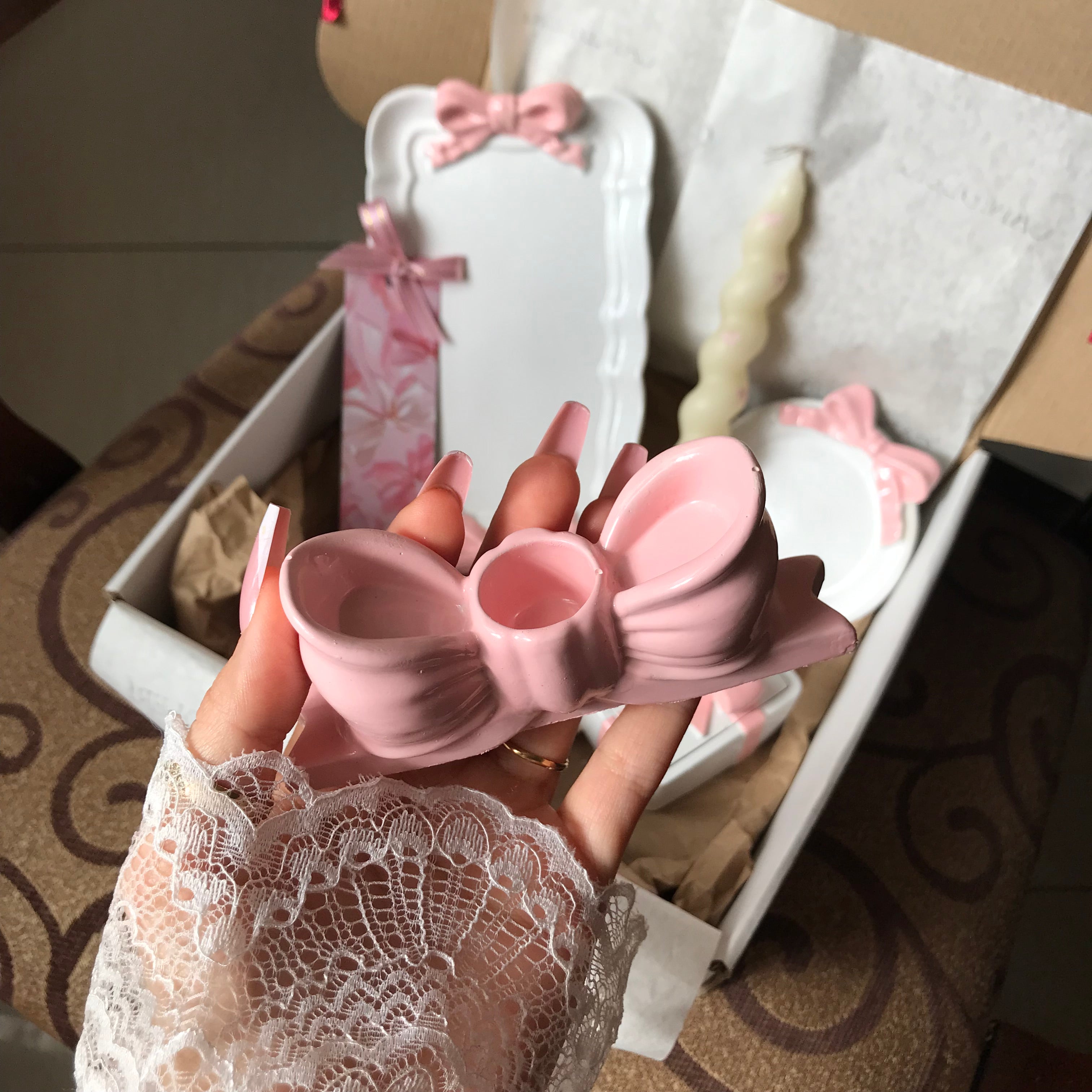 Candle holder bow